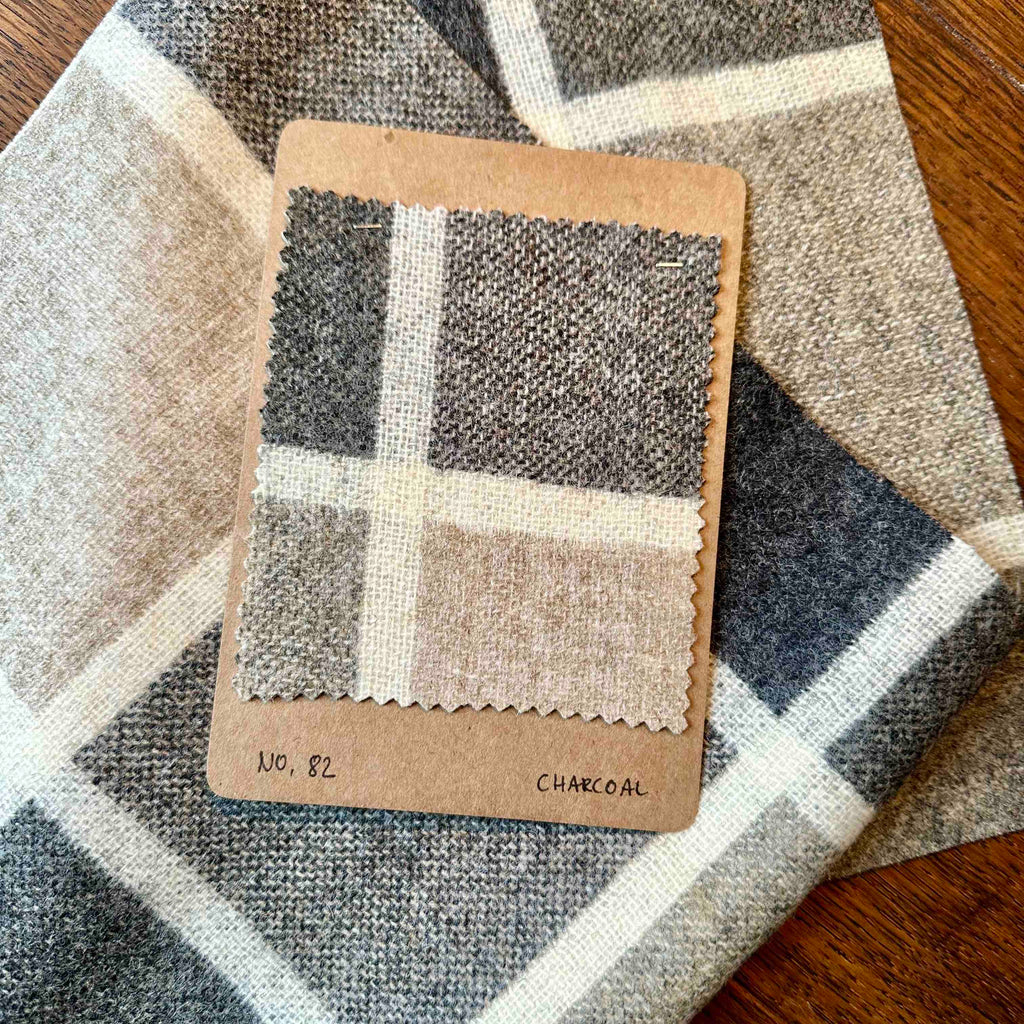 fabric swatch of check colour charcoal