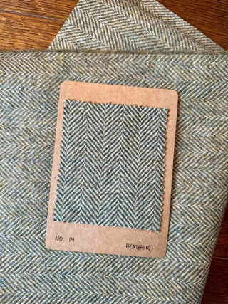 Little fabric swatch with article number of Herringbone Tweed colour Heather