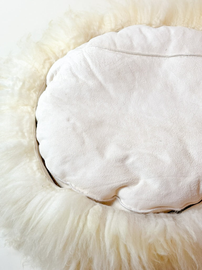 bottom of sheep donut Fluffy showing seam and leather