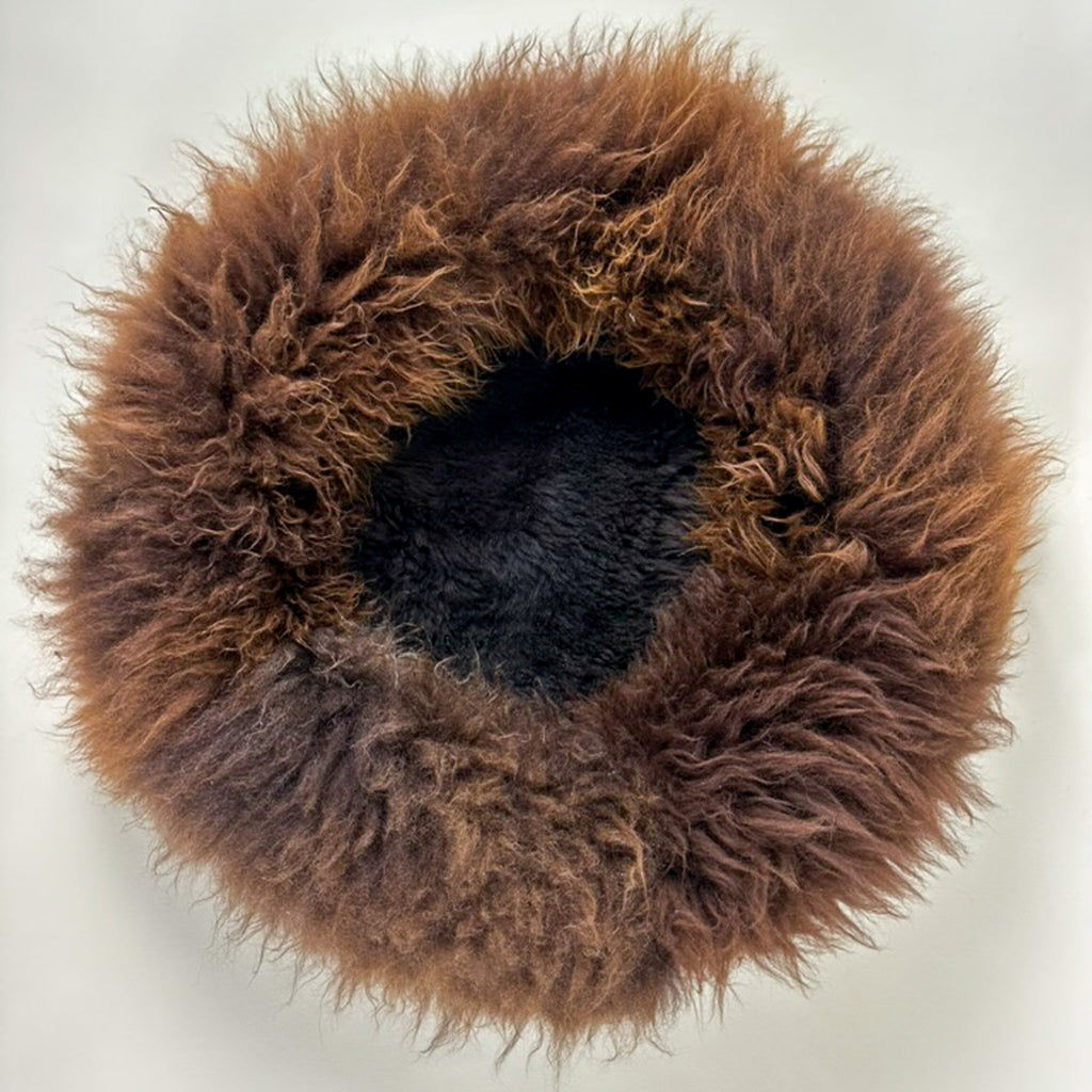 sheep donut in brown with dark brown inside bottom