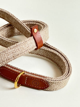 details of leather, logo and brass accessoires