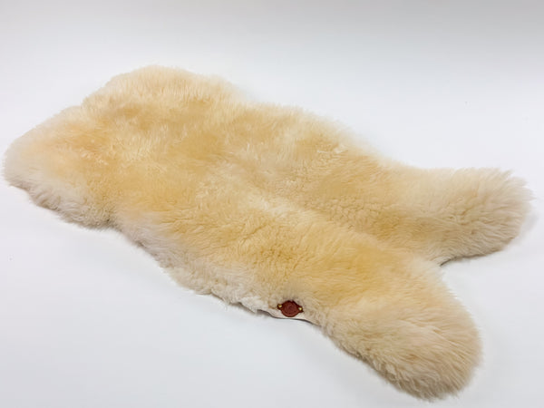 view of a sheep coat in colour creme