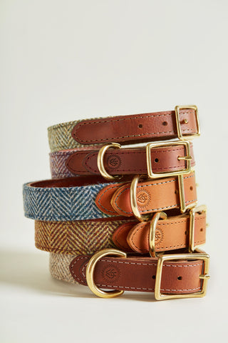 a pile of 5 different collar colours of tweed