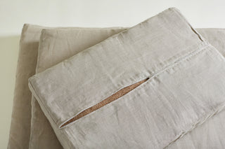 dog bed filling mattress upside down with half opened zipper