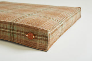 detail of leather label on dog bed Copperbeech