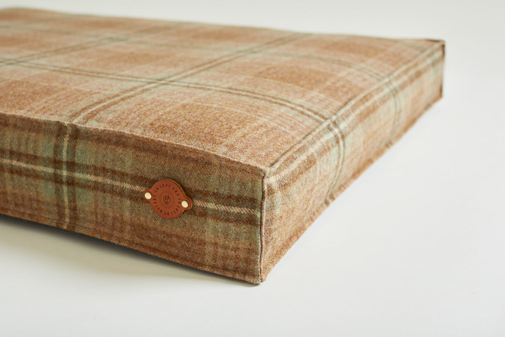 detail of leather label on dog bed Copperbeech
