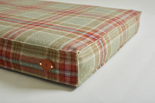 detail of leather label on dog bed Fern