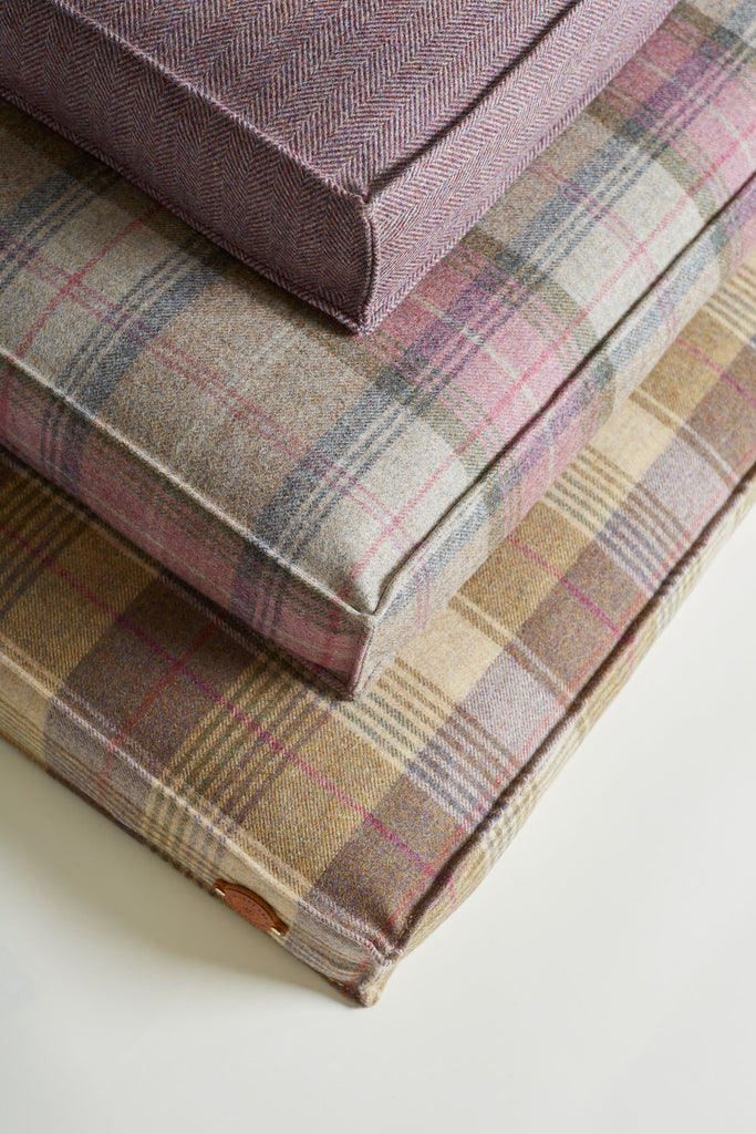 pile of 3 tweed dog beds in colour Hollyhock, Bluebell and Blackbeerry