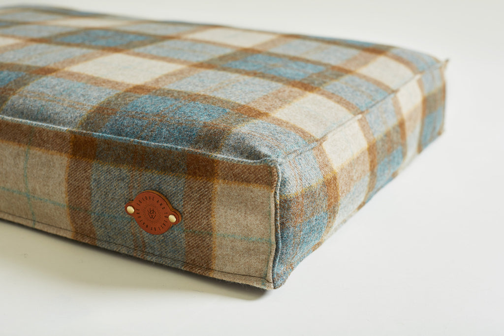 Details of leather label on tweed bed Kingfisher
