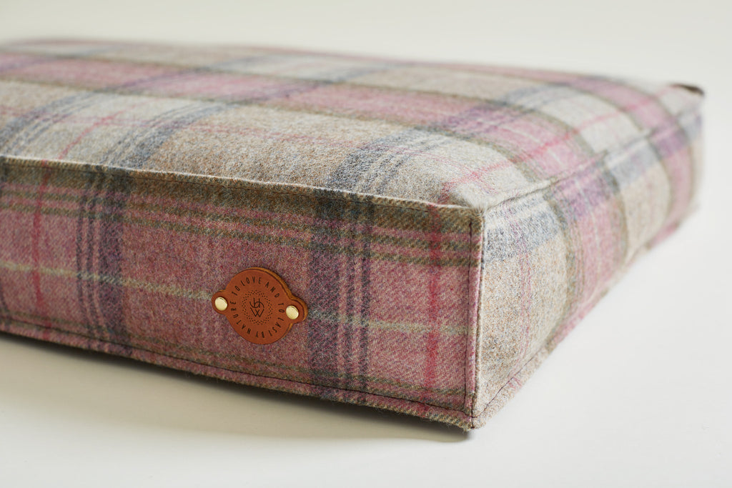 details of leather label on tweed dog bed Bluebell